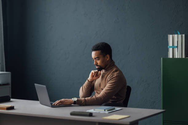 Comparison of a cluttered busy desk vs. an organized productive workspace