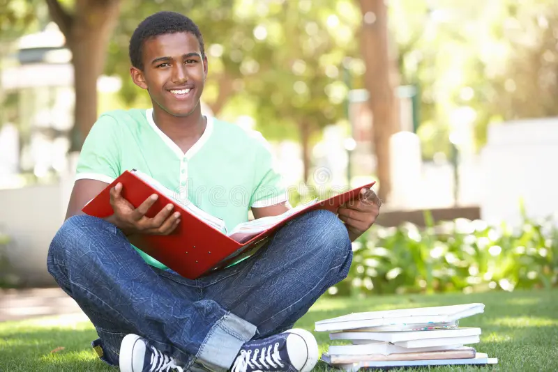 Happy older adult finishing a book and enjoying the mental benefits of reading